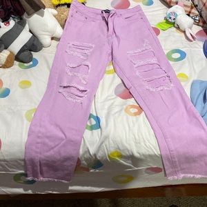 Purple jeans with rips